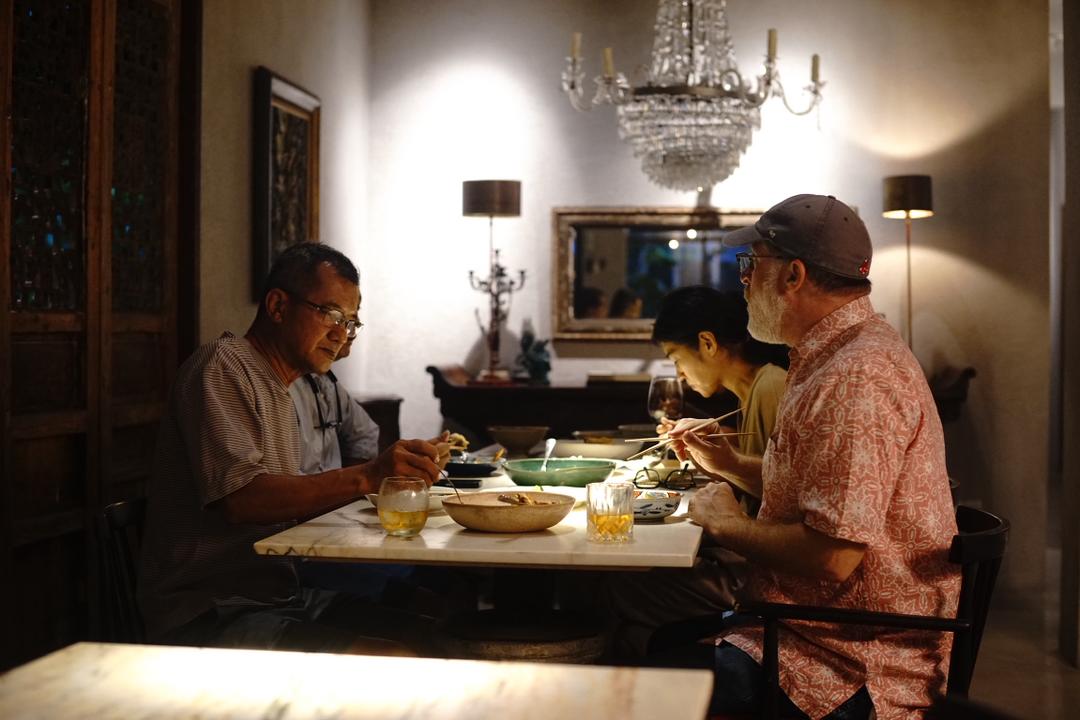 Guests seated together at Intasek during a Hakkachan evening